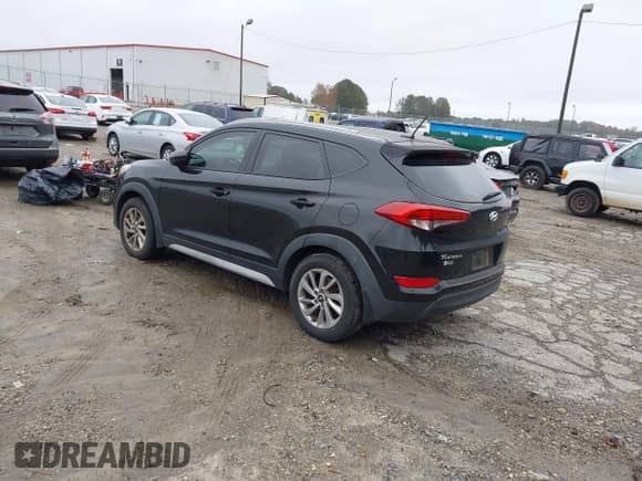 2017 Hyundai Tucson SE z VIN KM8J33A42HU585775, wystawiony jako IAAI lot #43521465 z przebiegiem 125 000 mil mil oraz . Historia ofert i sprzedaży dostępna na DreamBid. Obrazek 3.
