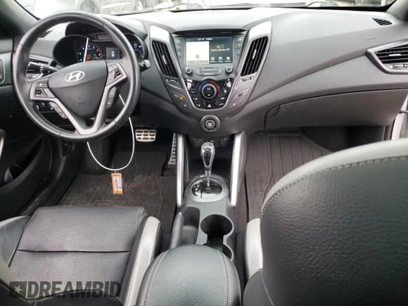 ✅ 2016 Hyundai Veloster Turbo Rally Edition • VIN: KMHTC6AE0GU257787 • Lot: 85323394. Wystawiony na Copart z przebiegiem 91 826 mil. Bezpłatny archiwum sprzedaży aukcyjnych z USA i szczegółowy raport historii pojazdu na DreamBid. Zdjęcie 8.