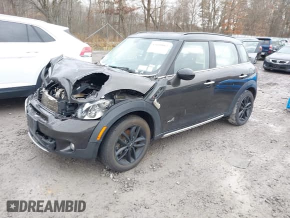 ✅ 2015 MINI Countryman S • VIN: WMWZC5C53FWP48053 • Lot: 43668067. Listed on IAAI with 129,672 mi. Free auction sales archive from the USA and detailed vehicle history report at DreamBid. Image 2.