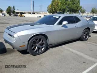 2012 Dodge Challenger SXT z VIN 2C3CDYAGXCH186372, wystawiony jako Copart lot #81943905 z przebiegiem 120 038 mil mil oraz Szkoda całkowita • Salvage title. Historia ofert i sprzedaży dostępna na DreamBid. Obrazek 1.