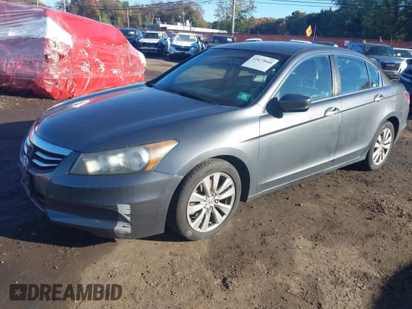 ✅ 2012 Honda Accord EX-L • VIN: 1HGCP2F86CA107605 • Lot: 43473840. Listed on IAAI with 241,282 mi. Free auction sales archive from the USA and detailed vehicle history report at DreamBid. Image 17.