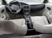 ✅ 2001 Saturn SC • VIN: 1G8ZP12881Z289924 • Лот: 90856305. Опубликован ранее на Copart с пробегом 99 502 миль. Бесплатный доступ к архиву аукционных продаж из США и подробный отчёт об истории автомобиля на DreamBid. Изображение 8.