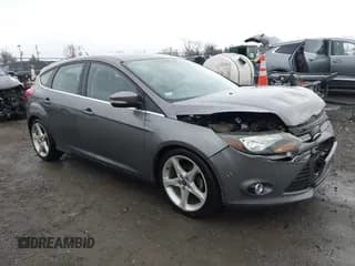 ✅ 2014 Ford Focus Titanium • VIN: 1FADP3N21EL391843 • Lot: 43802215. Listed on IAAI with 125,617 mi. Free auction sales archive from the USA and detailed vehicle history report at DreamBid. Image 1.
