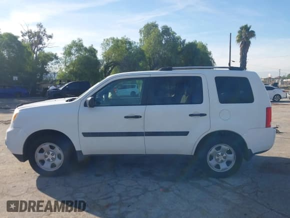 ✅ 2015 Honda Pilot LX • VIN: 5FNYF3H2XFB029864 • Lot: 43764389. Listed on IAAI with 101,141 mi. Free auction sales archive from the USA and detailed vehicle history report at DreamBid. Image 14.