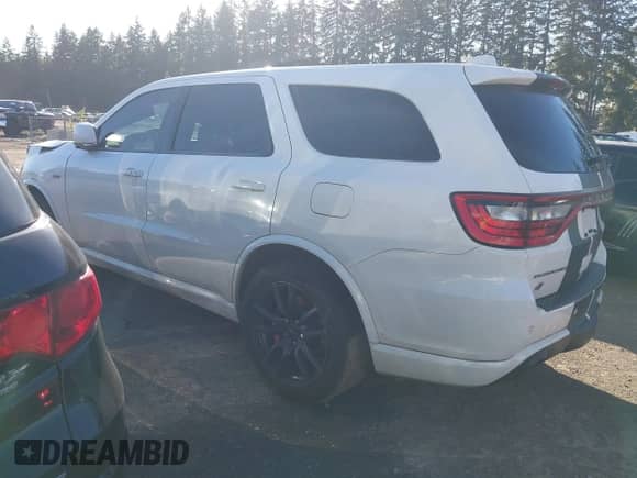 2018 Dodge Durango SRT with VIN 1C4SDJGJ3JC395759, listed as a IAAI auction lot 41689356 with 83,577 mi miles and . Bid and sale history available at DreamBid. Image 3.