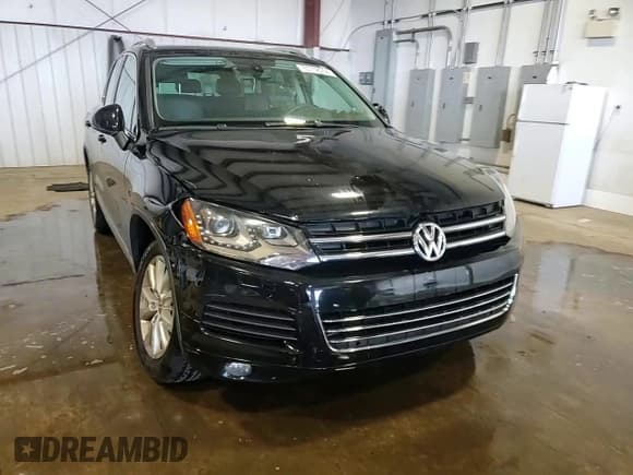 ✅ 2013 Volkswagen Touareg Lux • VIN: WVGEF9BP7DD007945 • Lot: 65758255. Listed on Copart with 90,086 mi. Free auction sales archive from the USA and detailed vehicle history report at DreamBid. Image 14.