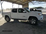 ✅ 2015 Toyota Tacoma • VIN: 3TMLU4EN2FM182321 • Lot: 92693405. Listed on Copart with 214,806 mi. Free auction sales archive from the USA and detailed vehicle history report at DreamBid. Image 4.