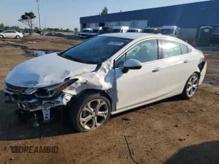 ✅ 2016 Chevrolet Cruze Premier • VIN: 1G1BG5SM4G7232905 • Lot: 62893295. Wystawiony na Copart z przebiegiem 93 444 mil. Bezpłatny archiwum sprzedaży aukcyjnych z USA i szczegółowy raport historii pojazdu na DreamBid. Zdjęcie 1.