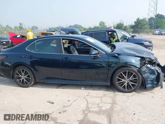 2021 Toyota Camry SE with VIN 4T1T11BKXMU042040, listed as a IAAI auction lot 42879951 with 35,130 mi miles and . Bid and sale history available at DreamBid. Image 13.