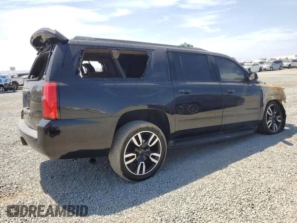 2020 Chevrolet Suburban Premier с VIN 1GNSCJKC4LR274399, выставлен на аукционе Copart как лот 70371165 с пробегом Не указан миль и На запчасти • Non repairable. История ставок и продаж доступна на DreamBid. Изображение 3.