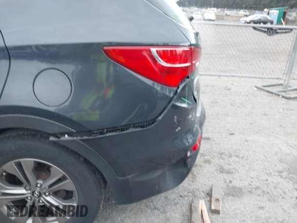 ✅ 2013 Hyundai Santa Fe Sport • VIN: 5XYZU3LB8DG087690 • Лот: 43492682. Опубликован ранее на IAAI с пробегом 124 249 миль. Бесплатный доступ к архиву аукционных продаж из США и подробный отчёт об истории автомобиля на DreamBid. Изображение 14.