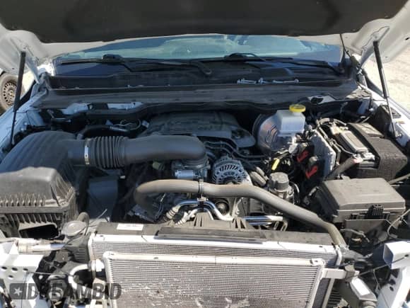 2022 Ram 1500 Tradesman z VIN 1C6SRFNT0NN447403, wystawiony jako Copart lot #46121624 z przebiegiem 23 489 mil mil oraz Szkoda całkowita • Salvage title. Historia ofert i sprzedaży dostępna na DreamBid. Obrazek 11.