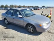 ✅ 1998 Toyota Corolla LE • VIN: 1NXBR18E5WZ099366 • Лот: 87099535. Опубликован ранее на Copart с пробегом 173 725 миль. Бесплатный доступ к архиву аукционных продаж из США и подробный отчёт об истории автомобиля на DreamBid. Изображение 4.