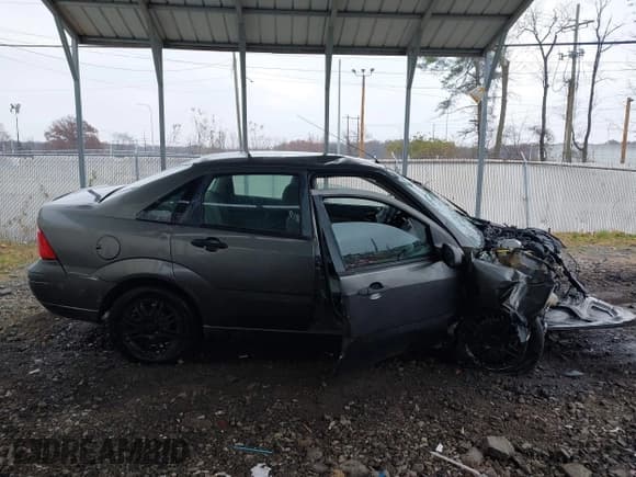 ✅ 2007 Ford Focus S • VIN: 1FAHP34N57W355717 • Lot: 43770039. Listed on IAAI with 245,774 mi. Free auction sales archive from the USA and detailed vehicle history report at DreamBid. Image 13.