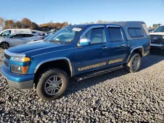 2009 Chevrolet Colorado 2LT with VIN 1GCDT13E598104732, listed as a Copart auction lot 90261935 with 105,508 mi miles and Clean title. Bid and sale history available at DreamBid. Image 1.
