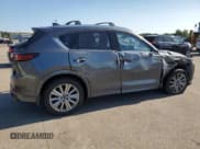 ✅ 2023 Mazda CX-5 Signature • VIN: JM3KFBXY0P0244795 • Lot: 65770745. Listed on Copart with 28,247 mi. Free auction sales archive from the USA and detailed vehicle history report at DreamBid. Image 3.