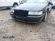 ✅ 1995 Cadillac Seville STS • VIN: 1G6KY5290SU817445 • Lot: 42900481. Wystawiony na IAAI z przebiegiem Nie podano. Bezpłatny archiwum sprzedaży aukcyjnych z USA i szczegółowy raport historii pojazdu na DreamBid. Zdjęcie 11.