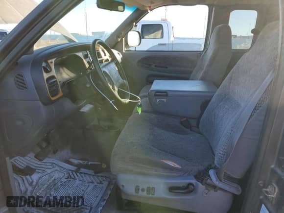 1999 Dodge 1500 с VIN 3B7HF13Z4XG160048, выставлен на аукционе Copart как лот 84405374 с пробегом 237 247 миль миль и Списание • Salvage title. История ставок и продаж доступна на DreamBid. Изображение 7.