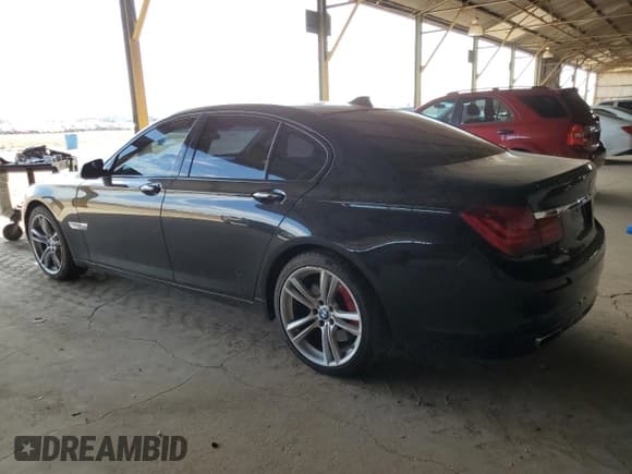 ✅ 2015 BMW 7 Series 750i • VIN: WBAYA8C58FG197731 • Lot: 81152265. Listed on Copart with 144,762 mi. Free auction sales archive from the USA and detailed vehicle history report at DreamBid. Image 2.