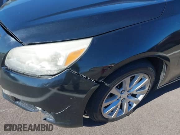 2013 Chevrolet Malibu LTZ z VIN 1G11H5SA5DF283605, wystawiony jako IAAI lot #43477302 z przebiegiem 160 937 mil mil oraz . Historia ofert i sprzedaży dostępna na DreamBid. Obrazek 6.