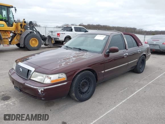 ✅ 2003 Mercury Grand Marquis GS Convenience • VIN: 2MEFM74W13X608197 • Lot: 43755712. Wystawiony na IAAI z przebiegiem 159 971 mil. Bezpłatny archiwum sprzedaży aukcyjnych z USA i szczegółowy raport historii pojazdu na DreamBid. Zdjęcie 2.