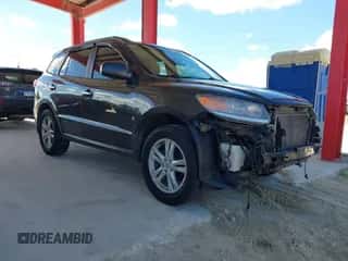 2012 Hyundai Santa Fe Limited with VIN 5XYZK4AG5CG147997, listed as a IAAI auction lot 43474178 with 172,339 mi miles and . Bid and sale history available at DreamBid. Image 1.