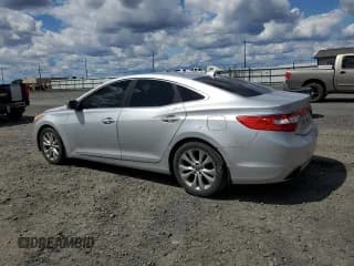 ✅ 2013 Hyundai Azera • VIN: KMHFG4JG7DA218926 • Лот: 57419495. Опубликован ранее на Copart с пробегом 90 968 миль. Бесплатный доступ к архиву аукционных продаж из США и подробный отчёт об истории автомобиля на DreamBid. Изображение 2.
