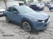 ✅ 2022 Mazda CX-30 S Carbon Edition • VIN: 3MVDMBCL0NM456154 • Lot: 42153202. Listed on IAAI with 40,372 mi. Free auction sales archive from the USA and detailed vehicle history report at DreamBid. Image 1.