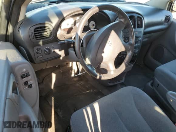 2005 Dodge Caravan SXT с VIN 2D4GP44L95R515634, выставлен на аукционе Copart как лот 74248204 с пробегом Не указан миль и Списание • Salvage title. История ставок и продаж доступна на DreamBid. Изображение 8.