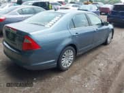 ✅ 2011 Ford Fusion Hybrid • VIN: 3FADP0L37BR302056 • Лот: 42680595. Опубликован ранее на IAAI с пробегом 276 846 миль. Бесплатный доступ к архиву аукционных продаж из США и подробный отчёт об истории автомобиля на DreamBid. Изображение 4.