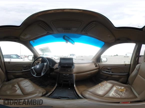 ✅ 2005 Honda Pilot EX-L • VIN: 5FNYF18535B053825 • Lot: 42482002. Listed on IAAI with 230,606 mi. Free auction sales archive from the USA and detailed vehicle history report at DreamBid. Image 18.