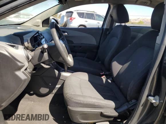 2013 Chevrolet Sonic LT с VIN 1G1JC5SB7D4142876, выставлен на аукционе Copart как лот 71410664 с пробегом Не указан миль и Списание • Salvage title. История ставок и продаж доступна на DreamBid. Изображение 7.