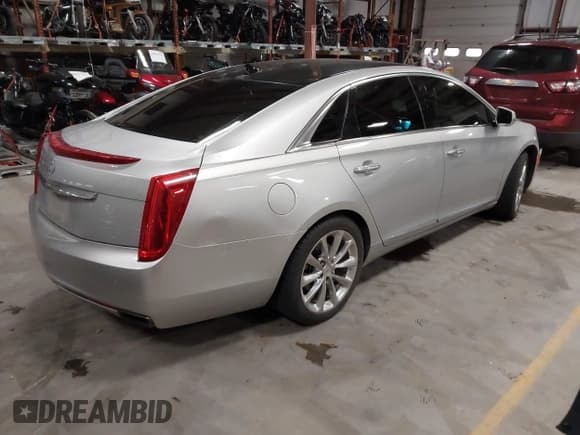 ✅ 2014 Cadillac XTS Luxury • VIN: 2G61N5S39E9292693 • Lot: 43661560. Listed on IAAI with 189,083 mi. Free auction sales archive from the USA and detailed vehicle history report at DreamBid. Image 4.