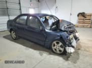 ✅ 2000 Mazda Protege ES • VIN: JM1BJ221XY0211385 • Lot: 48225605. Listed on Copart with Not provided. Free auction sales archive from the USA and detailed vehicle history report at DreamBid. Image 4.