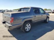 ✅ 2014 Honda Ridgeline RTL • VIN: 5FPYK1F57EB005668 • Lot: 80218335. Listed on Copart with 142,165 mi. Free auction sales archive from the USA and detailed vehicle history report at DreamBid. Image 3.