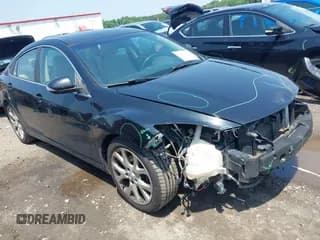 ✅ 2013 Mazda 6 S Grand Touring • VIN: 1YVHZ8CB0D5M05878 • Lot: 42268928. Listed on IAAI with 123,885 mi. Free auction sales archive from the USA and detailed vehicle history report at DreamBid. Image 1.