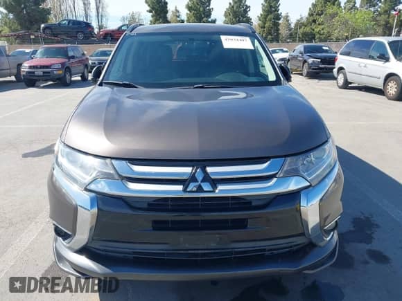 2016 Mitsubishi Outlander SE with VIN JA4AZ3A36GZ018927, listed as a IAAI auction lot 42034407 with 337,750 mi miles and . Bid and sale history available at DreamBid. Image 6.