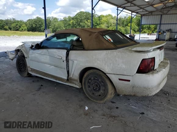 ✅ 2002 Ford Mustang Deluxe • VIN: 1FAFP44412F113486 • Lot: 69901725. Listed on Copart with 214,518 mi. Free auction sales archive from the USA and detailed vehicle history report at DreamBid. Image 2.