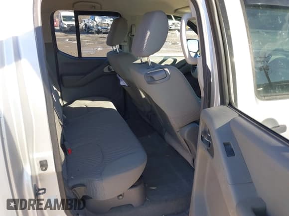 ✅ 2013 Nissan Frontier SL • VIN: 1N6AD0EV0DN731594 • Lot: 41702767. Listed on IAAI with 101,611 mi. Free auction sales archive from the USA and detailed vehicle history report at DreamBid. Image 8.