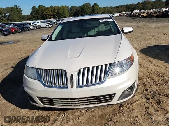 ✅ 2011 Lincoln MKS • VIN: 1LNHL9DR6BG615164 • Lot: 90116955. Listed on Copart with 125,837 mi. Free auction sales archive from the USA and detailed vehicle history report at DreamBid. Image 13.