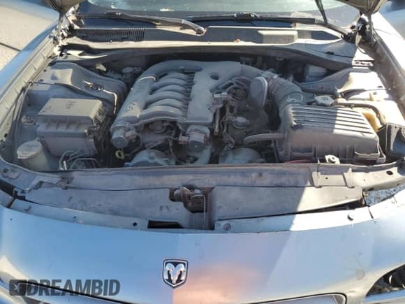 2007 Dodge Charger z VIN 2B3KA43G87H778589, wystawiony jako Copart lot #70492974 z przebiegiem 284 406 mil mil oraz Szkoda całkowita • Salvage title. Historia ofert i sprzedaży dostępna na DreamBid. Obrazek 11.