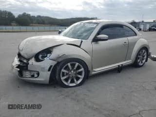 ✅ 2016 Volkswagen Beetle SE • VIN: 3VWJ17AT1GM604504 • Lot: 82553935. Wystawiony na Copart z przebiegiem Nie podano. Bezpłatny archiwum sprzedaży aukcyjnych z USA i szczegółowy raport historii pojazdu na DreamBid. Zdjęcie 1.