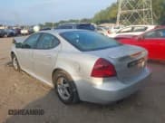 ✅ 2004 Pontiac Grand Prix GT2 • VIN: 2G2WS522041143934 • Lot: 43004541. Listed on IAAI with 172,954 mi. Free auction sales archive from the USA and detailed vehicle history report at DreamBid. Image 3.