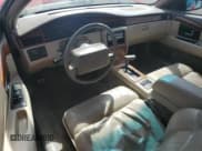✅ 1992 Cadillac Eldorado • VIN: 1G6EL13BXNU613746 • Lot: 53699085. Wystawiony na Copart z przebiegiem 147 655 mil. Bezpłatny archiwum sprzedaży aukcyjnych z USA i szczegółowy raport historii pojazdu na DreamBid. Zdjęcie 8.