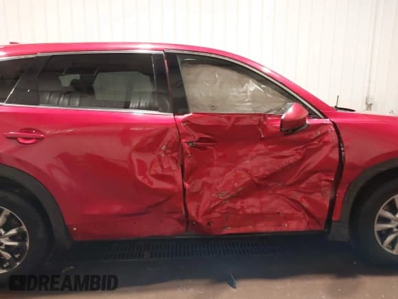 ✅ 2017 Mazda CX-9 Touring • VIN: JM3TCBCY2H0131659 • Lot: 41674239. Listed on IAAI with 168,129 mi. Free auction sales archive from the USA and detailed vehicle history report at DreamBid. Image 13.