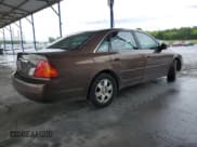 ✅ 2000 Toyota Avalon XL • VIN: 4T1BF28B3YU042591 • Лот: 68277995. Опубликован ранее на Copart с пробегом 312 652 миль. Бесплатный доступ к архиву аукционных продаж из США и подробный отчёт об истории автомобиля на DreamBid. Изображение 3.