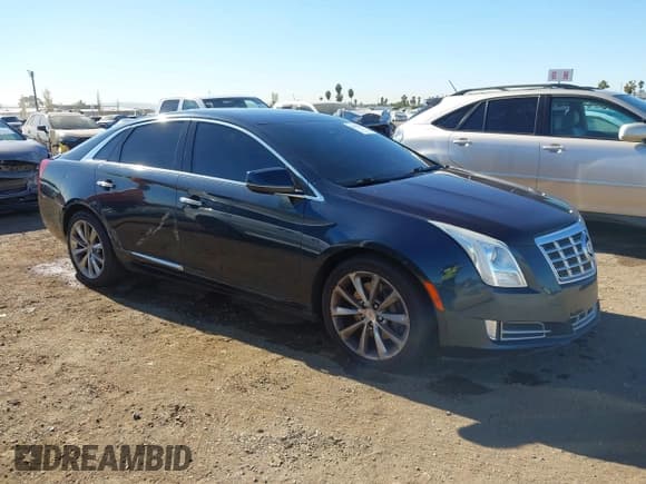 ✅ 2013 Cadillac XTS Luxury • VIN: 2G61P5S30D9149205 • Lot: 43905033. Wystawiony na IAAI z przebiegiem 159 114 mil. Bezpłatny archiwum sprzedaży aukcyjnych z USA i szczegółowy raport historii pojazdu na DreamBid. Zdjęcie 1.