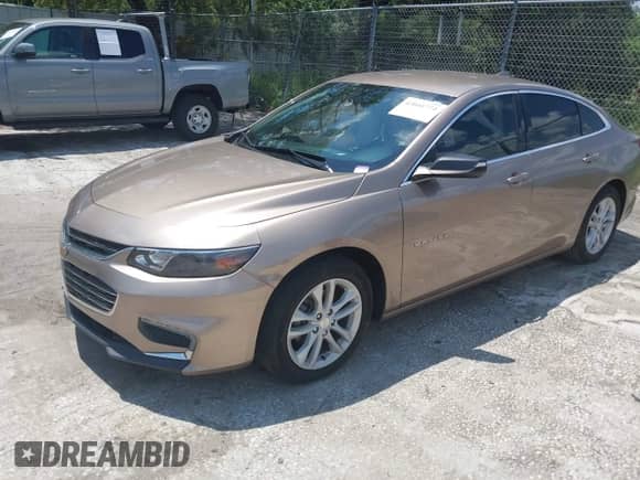 2018 Chevrolet Malibu LT z VIN 1G1ZD5ST0JF216213, wystawiony jako IAAI lot #43041774 z przebiegiem 95 829 mil mil oraz . Historia ofert i sprzedaży dostępna na DreamBid. Obrazek 2.
