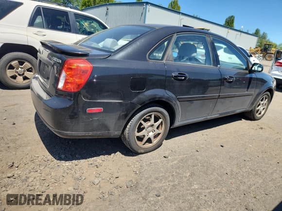 ✅ 2006 Suzuki Forenza • VIN: KL5JD56Z56K409111 • Lot: 63887835. Wystawiony na Copart z przebiegiem 127 126 mil. Bezpłatny archiwum sprzedaży aukcyjnych z USA i szczegółowy raport historii pojazdu na DreamBid. Zdjęcie 3.