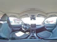 ✅ 2023 Toyota Corolla Cross XLE • VIN: 7MUDAABG9PV076750 • Лот: 51434765. Опубликован ранее на Copart с пробегом Не указан. Бесплатный доступ к архиву аукционных продаж из США и подробный отчёт об истории автомобиля на DreamBid. Изображение 13.